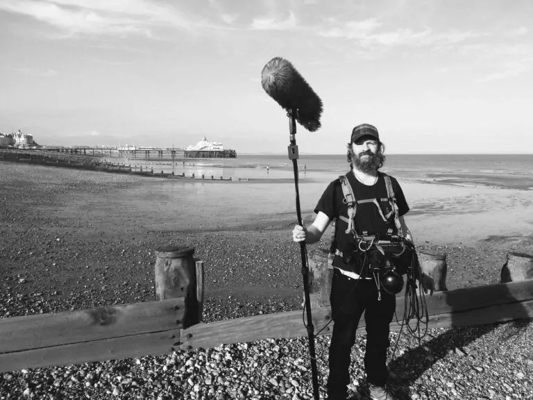 Len on location by the coast
