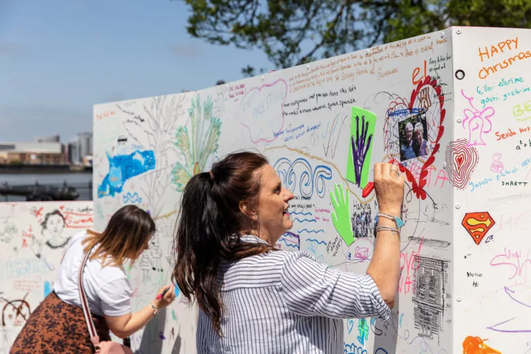 Artist Liz Bylett leads a workshop at Bob and Roberta Smith’s Draw Hope pavilion in Chatham during Estuary 2021